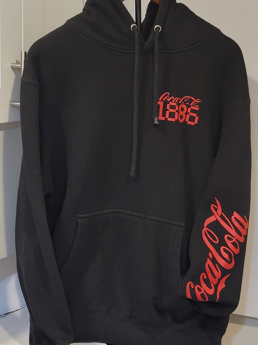 Coca Cola Black Pullover Hoodie with Red Script Sleeve